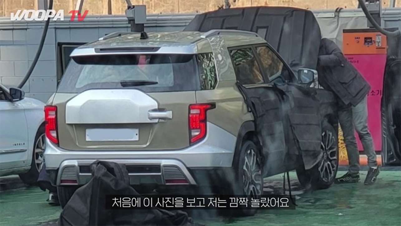 A half-camouflaged J100 prototype has been spied testing. (Image credit: Woopa TV)