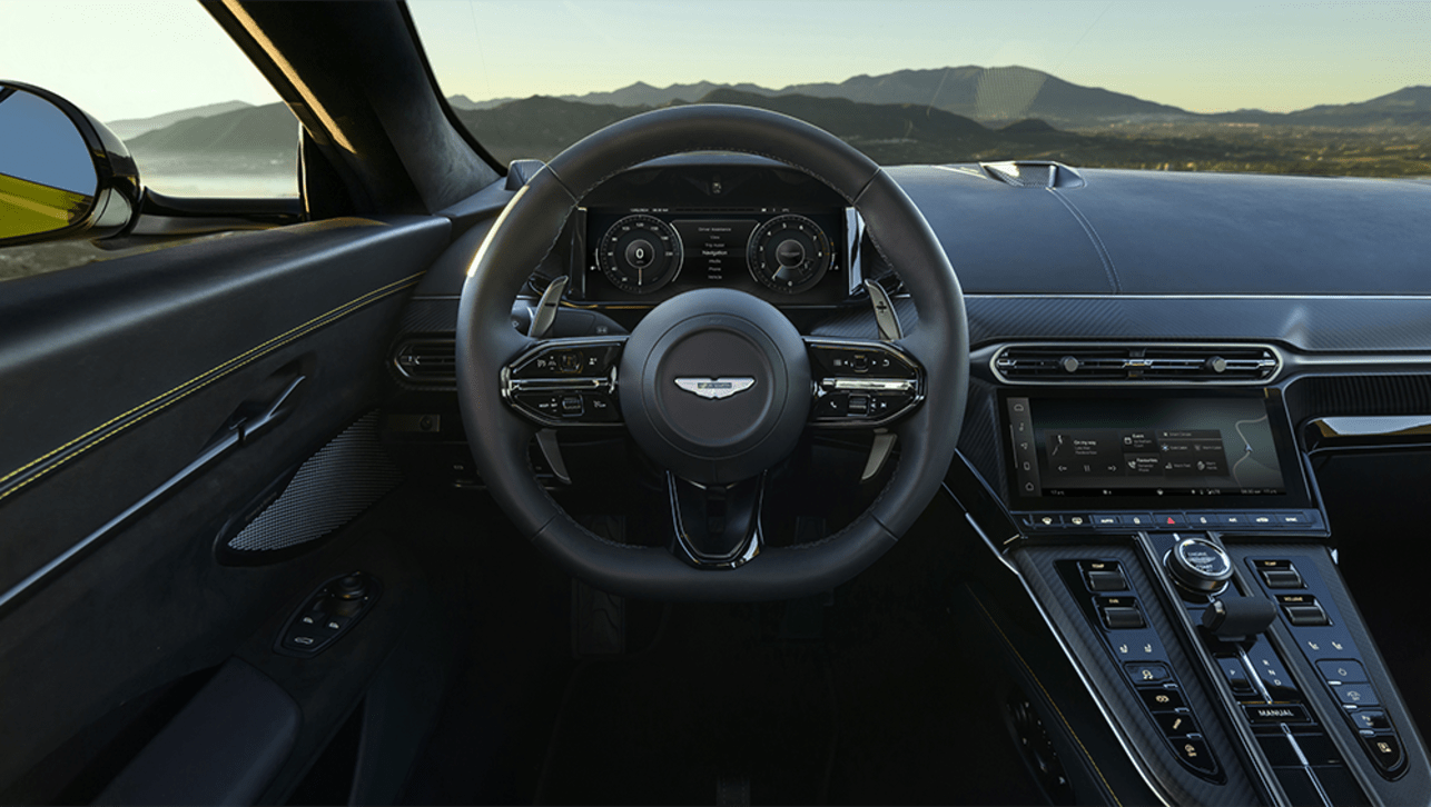 Miles Nurnberger, Aston Martin Director of Design, says screens can “take away the tactility” of driving a car.