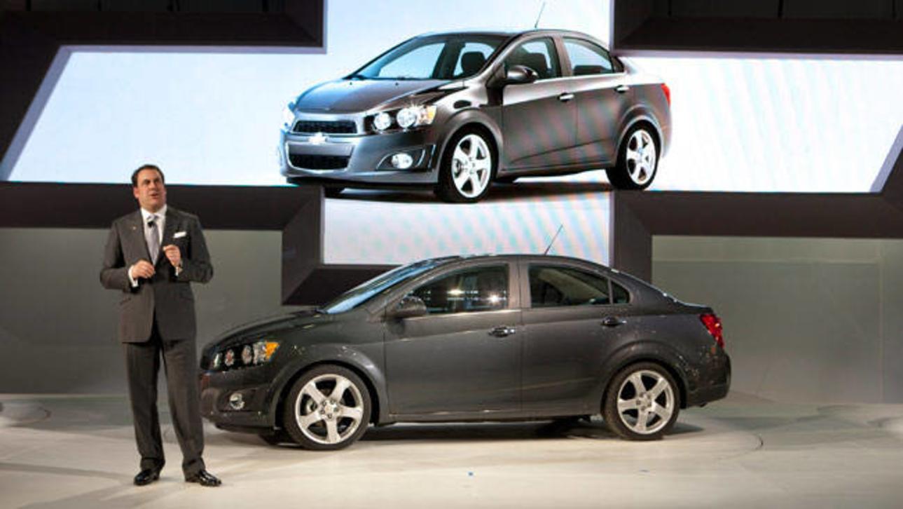 GM President North America Mark Reuss introduces the 2012 Chevrolet Sonic four-door sedan at the Detroit Show.