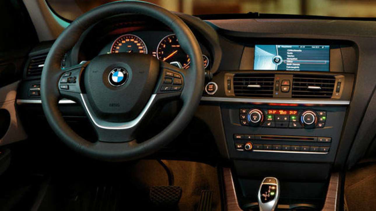 In the BMW X3 there is nowhere to store the key in the dashboard.