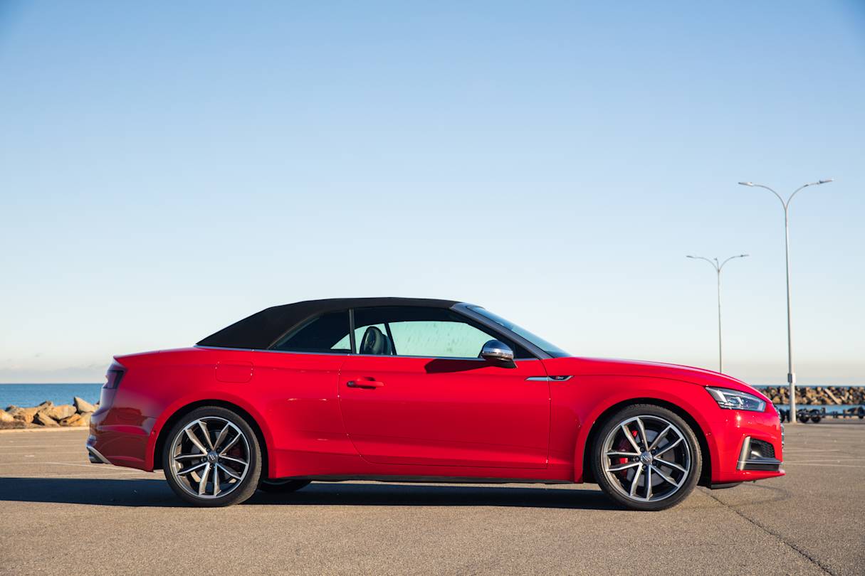 Its lines are undeniably interrupted by its fabric roof, which looks like its perched on top of the body like a cap.