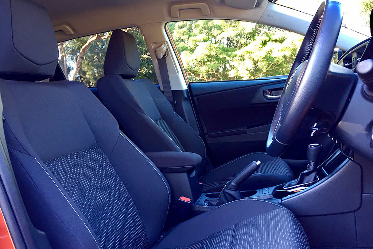The centre console is deep but not large, as the handbrake eats into the space. (image credit: Richard Berry)