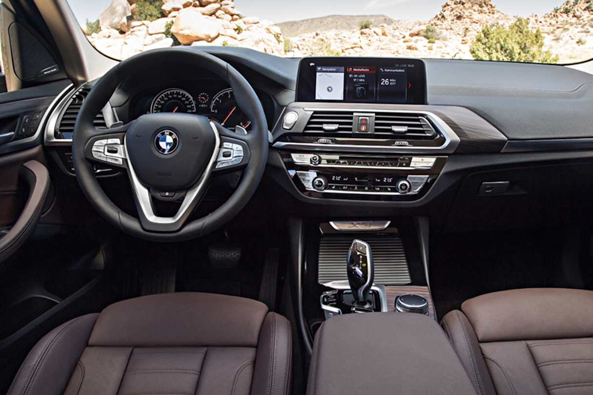 On the inside, there is a leather sport steering wheel, front cloth/leather electric sports seats and colour head-up display.