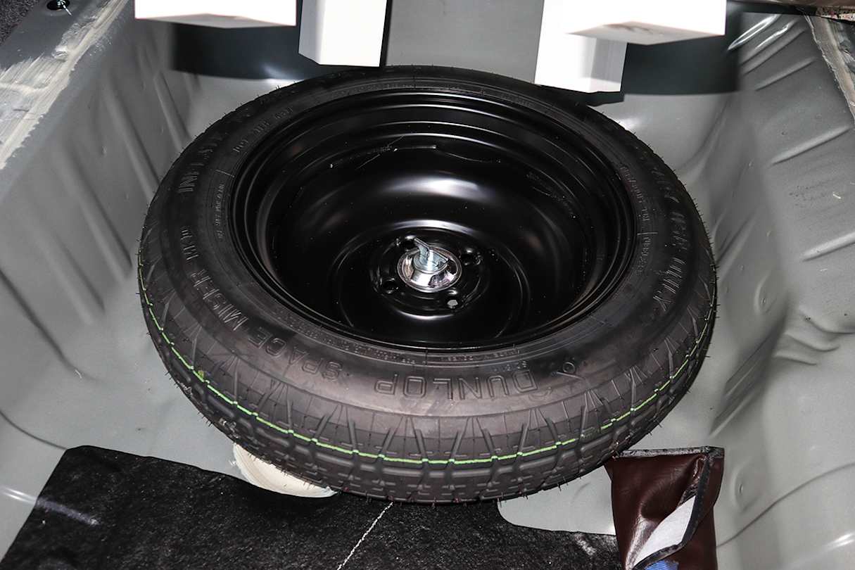A space saver spare nestles under the boot floor. (image credit: Tim Robson)