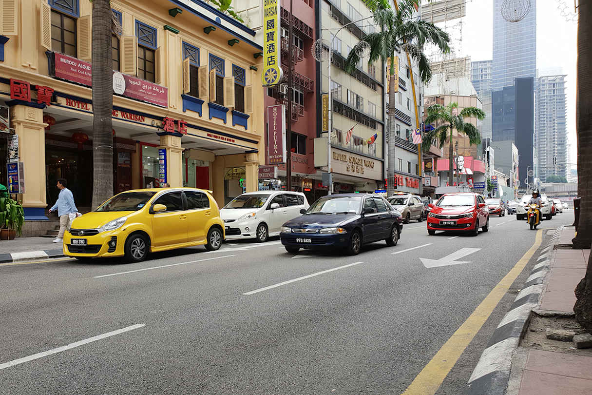 Kuala Lumpur, Malaysia. Notice anything particular about the cars in this image?