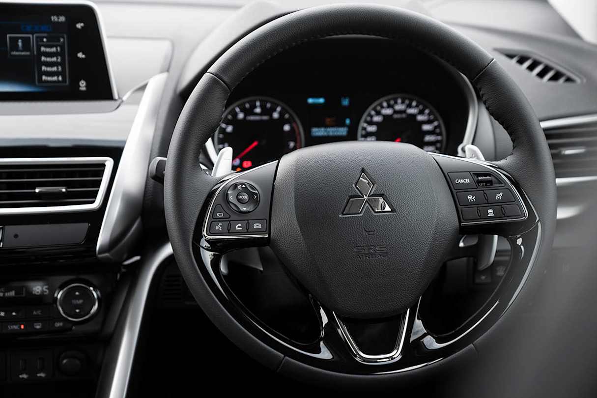 The adjustment for the height of the display is via a simple switch next to the steering wheel.