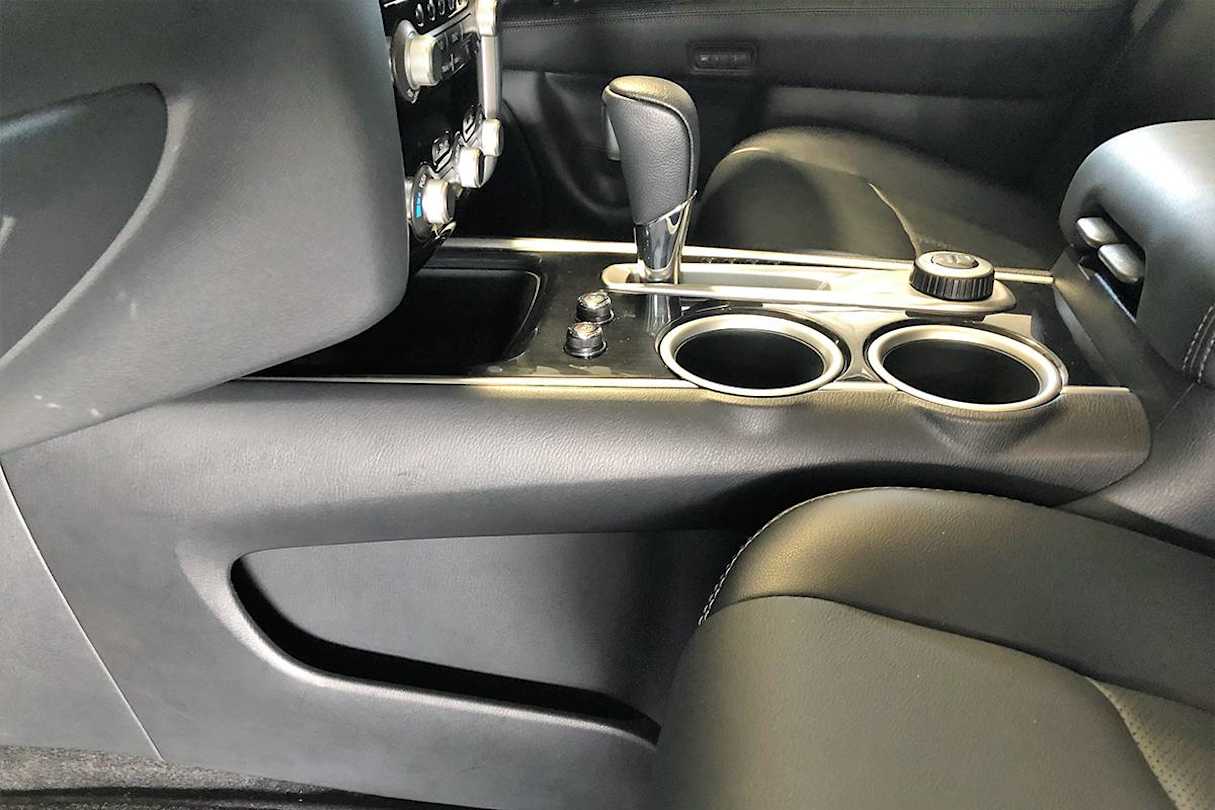 Front seat occupants get heated and cooled seats and a set of cupholders.