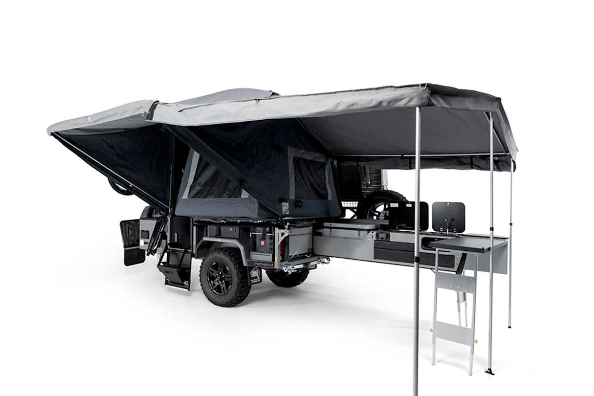 Trackabout, like Patriot, has a folding bed system, so the bed hangs off the side of the camper when set up.