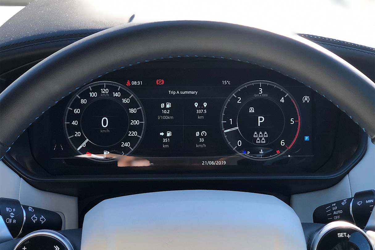 Behind the steering wheel is a full digital instrument cluster. 