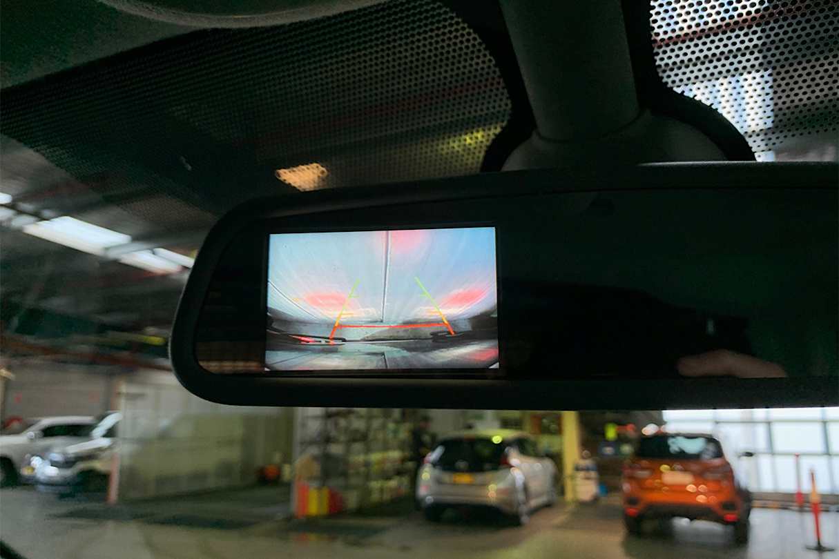 The 2.0L auto models add a reversing camera, which is integrated into an auto-dimming rearview mirror. (LWB model shown)