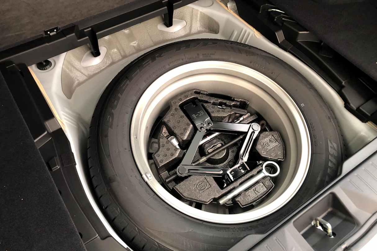 Under the boot floor is a full-sized spare alloy wheel.