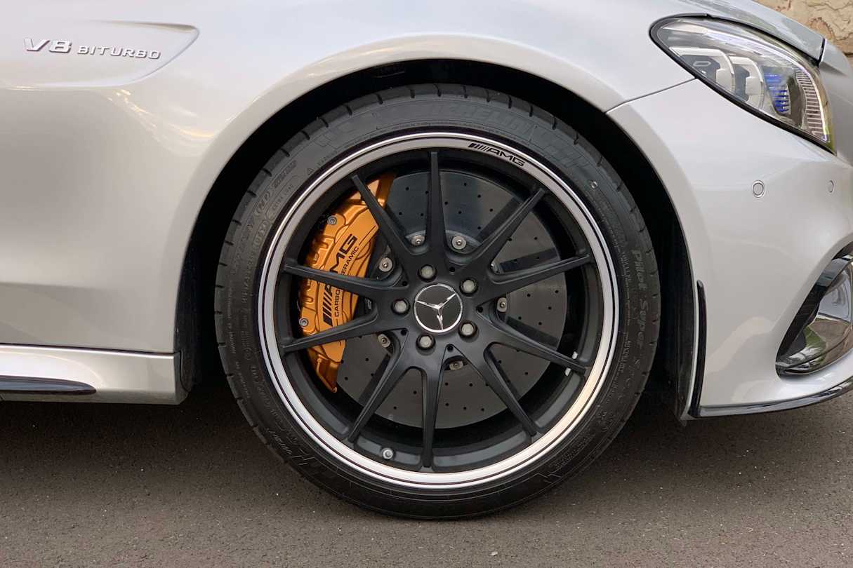 The “ultra-lightweight” AMG forged 'Matt Black' alloy wheels with 19-inch rims are featured at the front.
