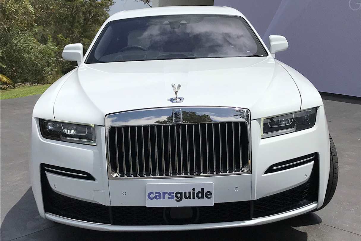 The car’s broad surfaces are tightly wrapped and deceptively simple.