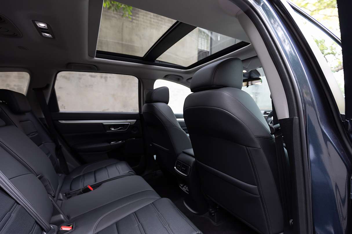 There is enough leg and headroom that my taller family members are comfortable in it, even with the sunroof.