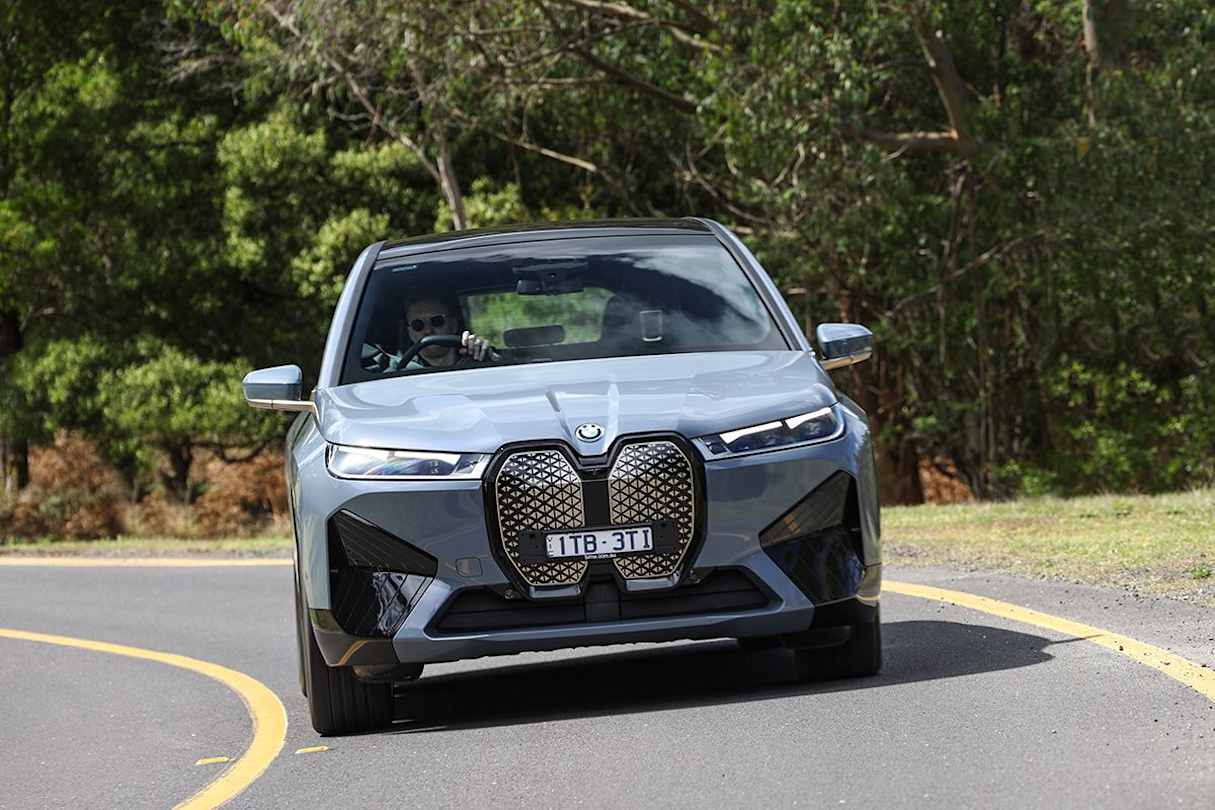 Even in Efficient driving mode, the iX M60 still wants to break free.