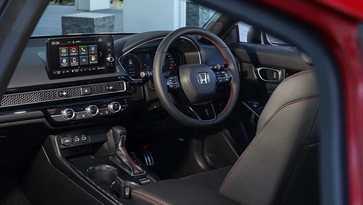 The new CR-V could adopt the new Civic's (above) neater interior deign.
