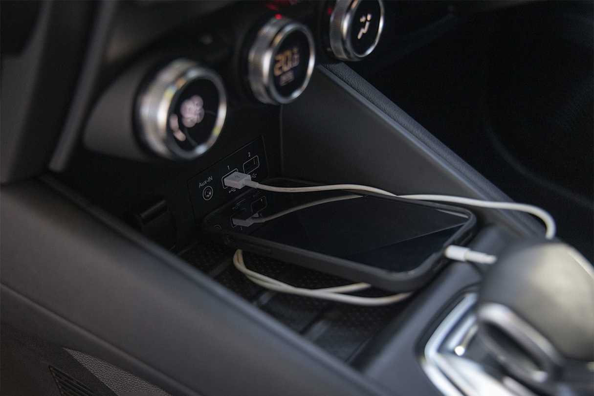 Underneath the dash there are 12-volt and auxiliary sockets, plus two USB ports. (Image: Glen Sullivan)