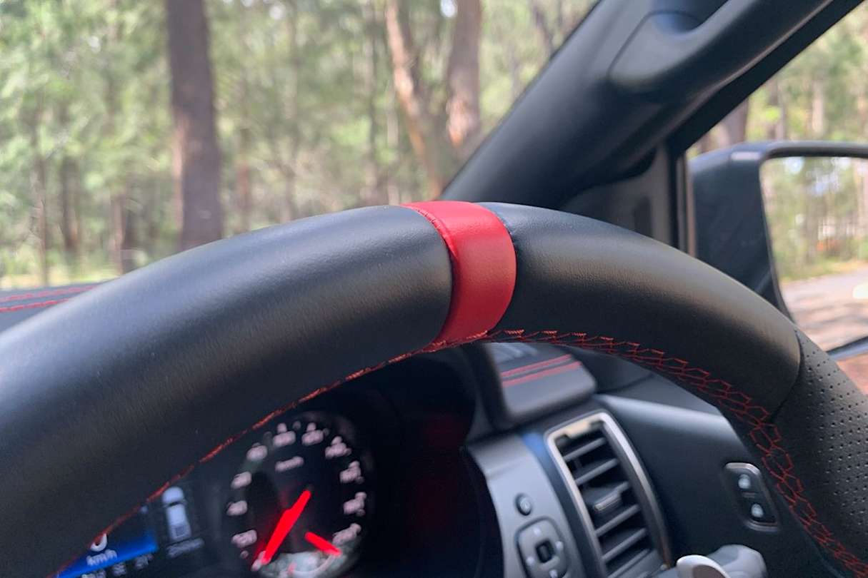 The revised interior trim with red stitching matches the exterior sticker pack. (Image: Matt Campbell).