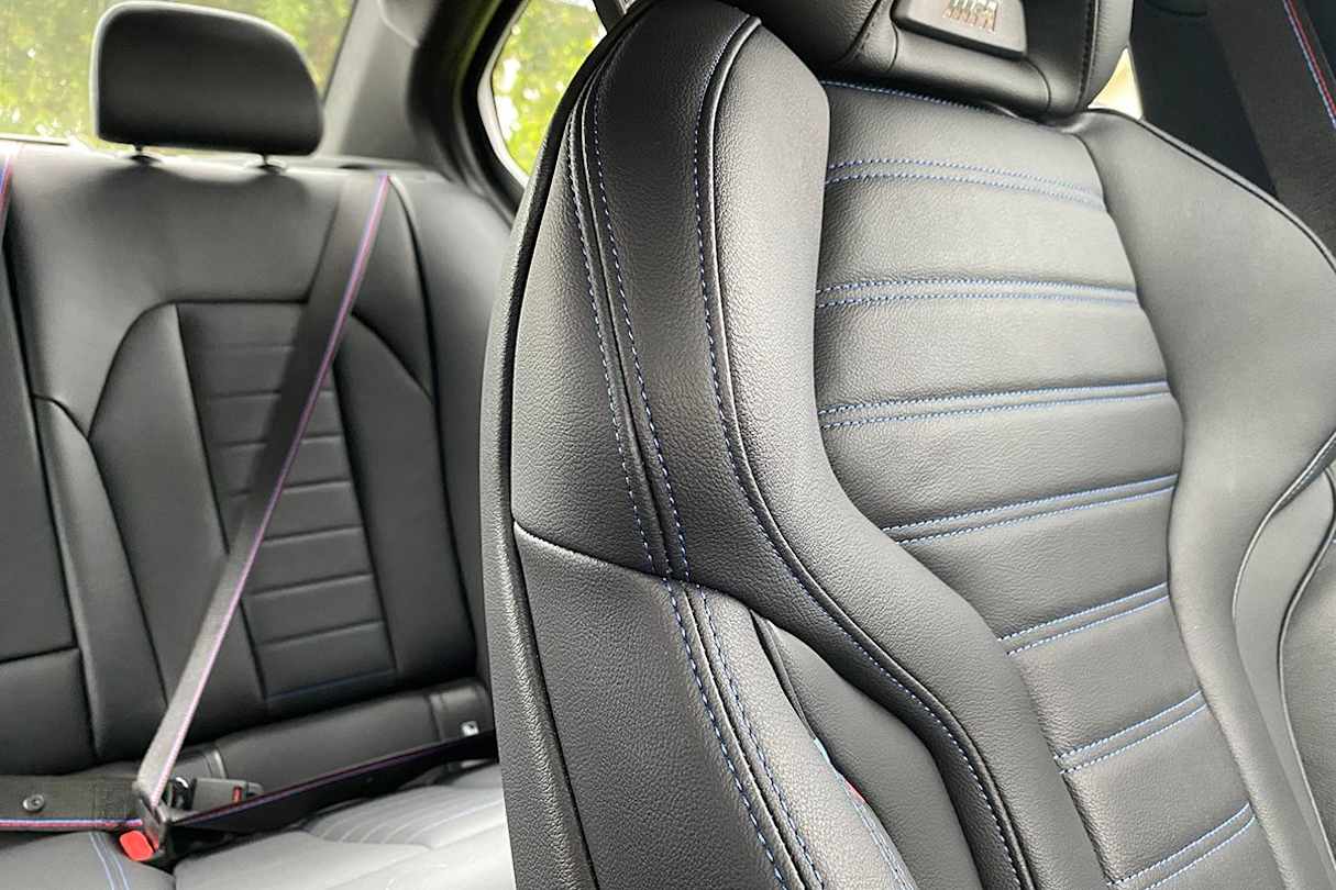 The M Sport pack adds  M Sport seats, but the M Sport Pro Pack our car came with adds the snazzy seat belts. (image: Richard Berry)