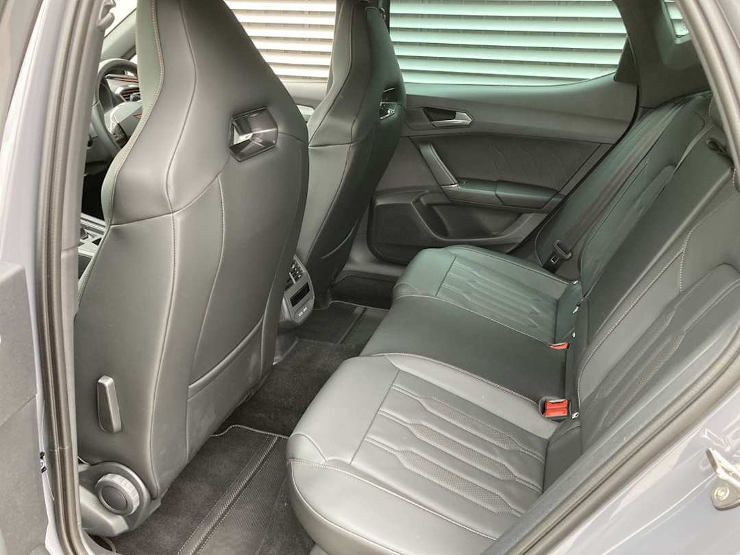 The rear bench accommodates three people, though the middle passenger sits higher and has limited legroom due to the rear of the centre console intruding into their space.