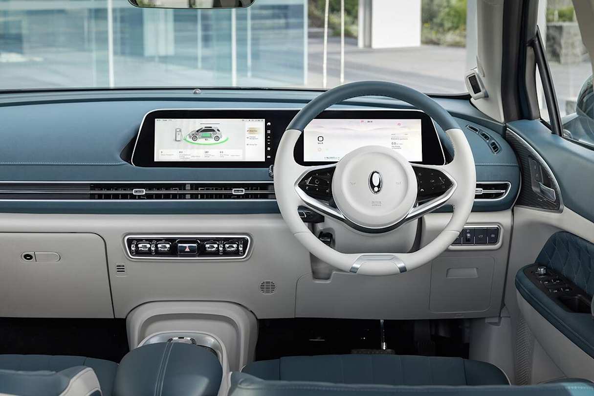 The dash and steering wheel are two-tone.