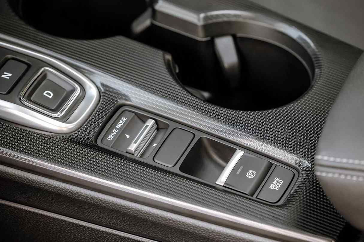 There are three self-explanatory modes: 'Eco', 'Normal' and 'Sport'.