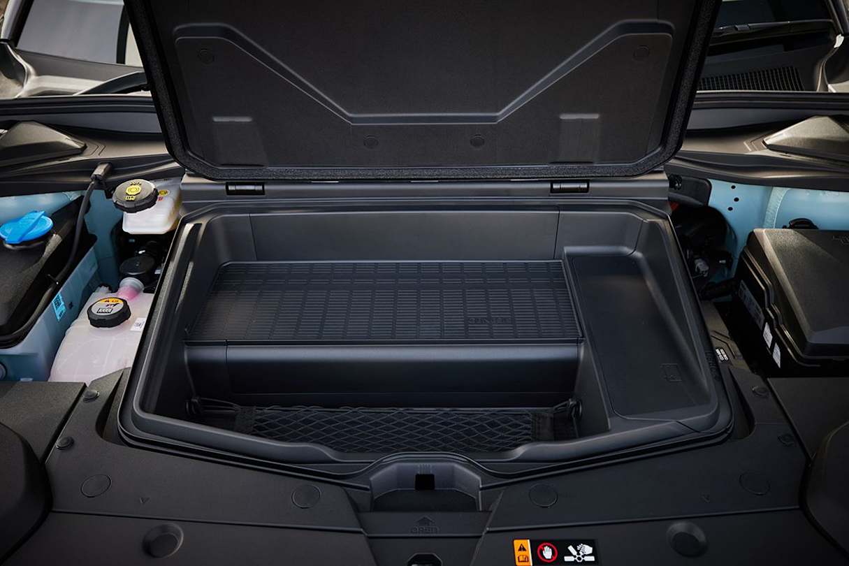 Under the bonnet is a small storage compartment. (AWD Performance variant pictured)