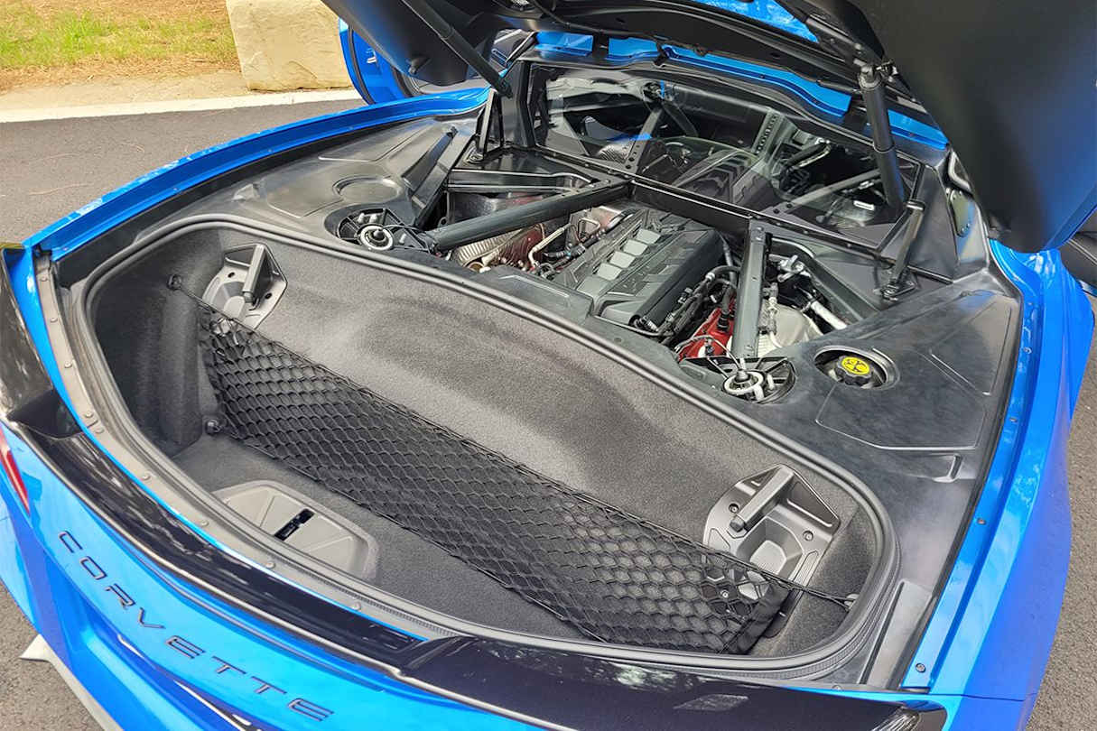 There’s a small storage space under the bonnet.