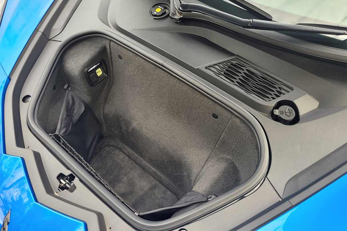 There is a larger section for storage at the rear of the car.