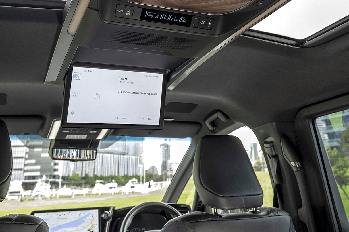 Inside the luxury people mover is a 14.0-inch display screen that retracts from the roof.