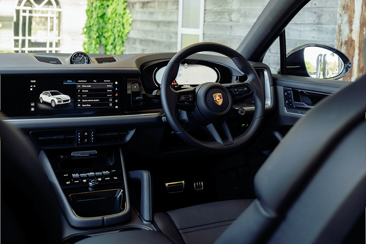 The lower grade Cayenne models get manual steering wheel adjustment. (Base grade pictured)