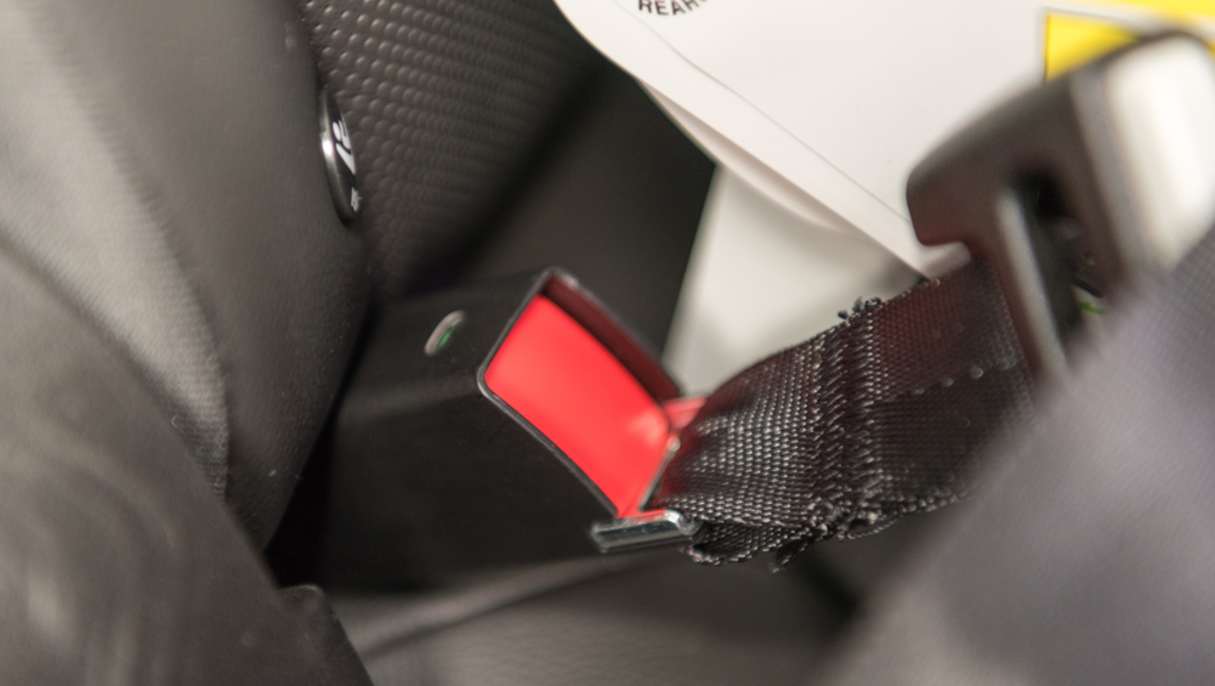 Some child seat clips can take a bit of force to get into the anchoring point.