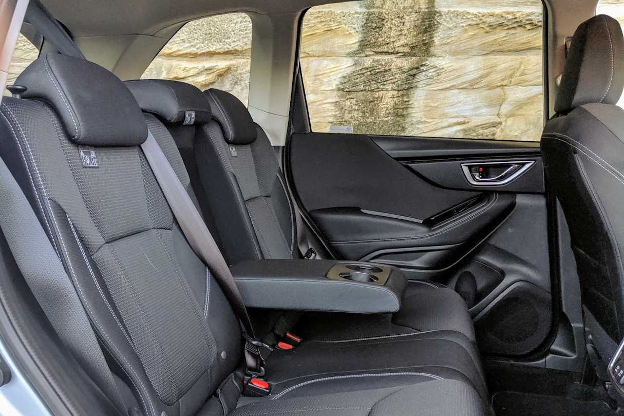 There's plenty of storage on offer throughout, with two cup holders front and rear.