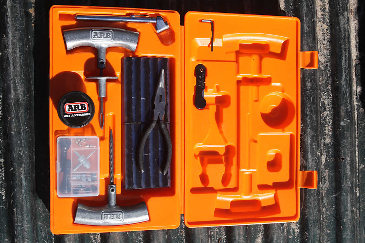 A tyre-puncture repair kit.