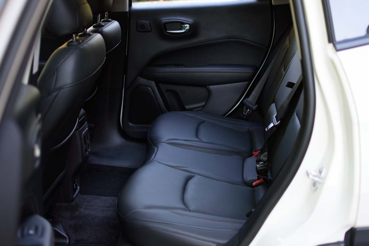 The back seat is about as roomy and comfortable as the front. Dual rear vents are a welcome addition. (image credit: Tom White)