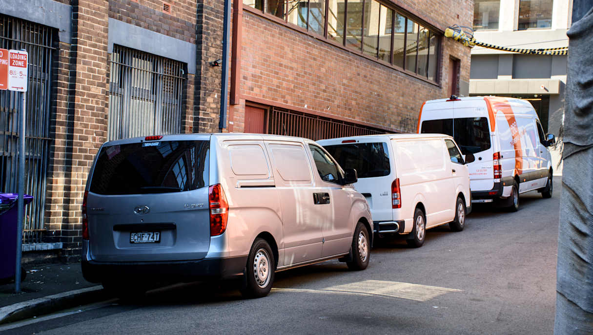 An example of commercial vehicles correctly using a loading zone in NSW.