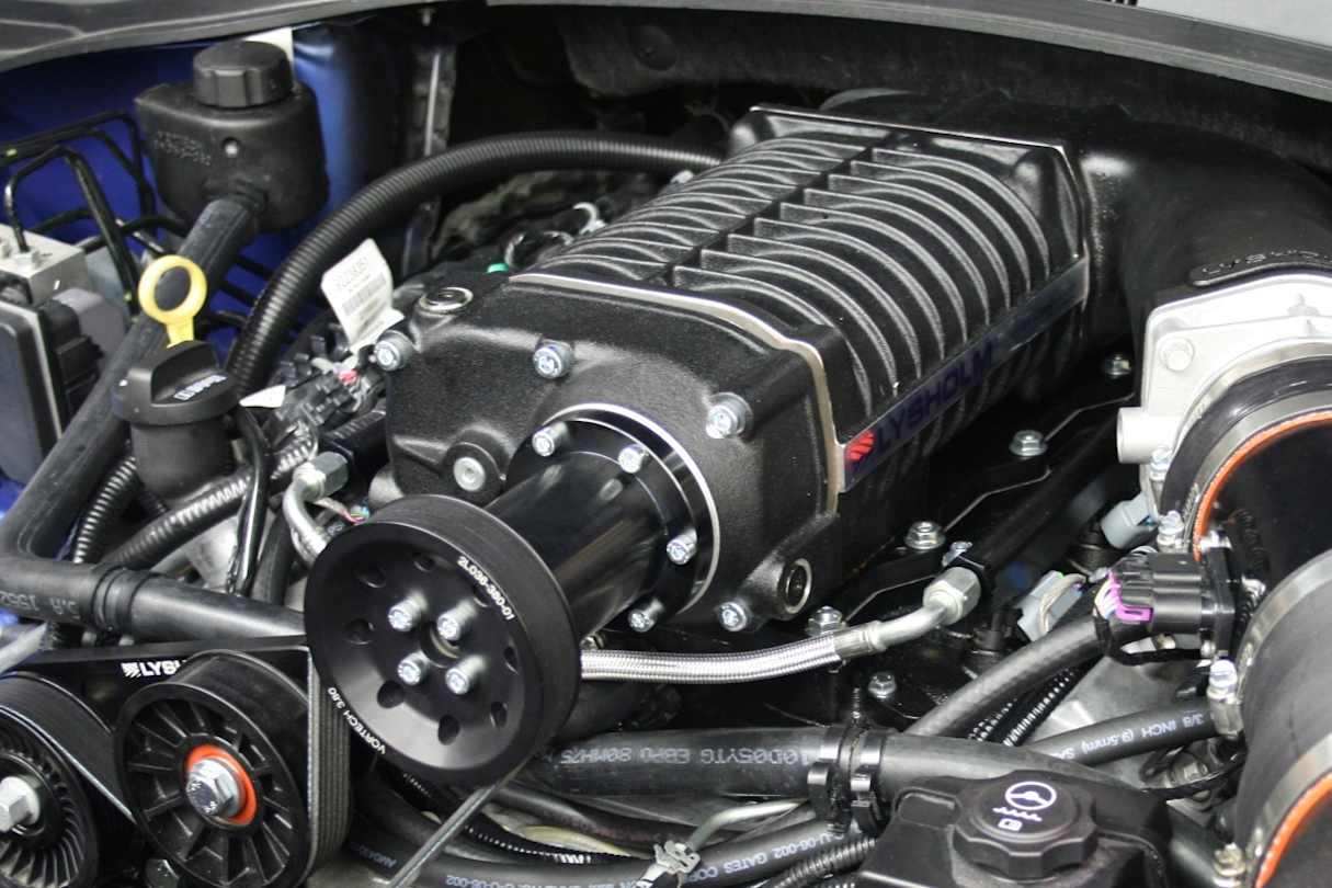 A twin-screw supercharger sits in the bay of a Camaro SS. (image credit: Camaro5.com)