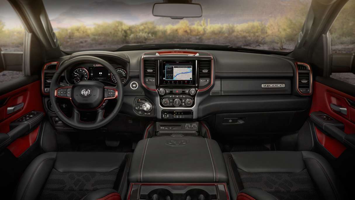 A massive 12.0-inch touchscreen is the centerpiece of the interior.
