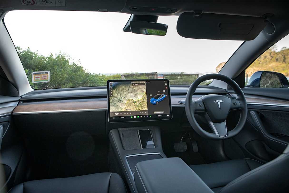 The cabin takes minimalism to the extreme, with just the single massive centre tablet interrupting the clean lines of the dash. (Image: Tom White)