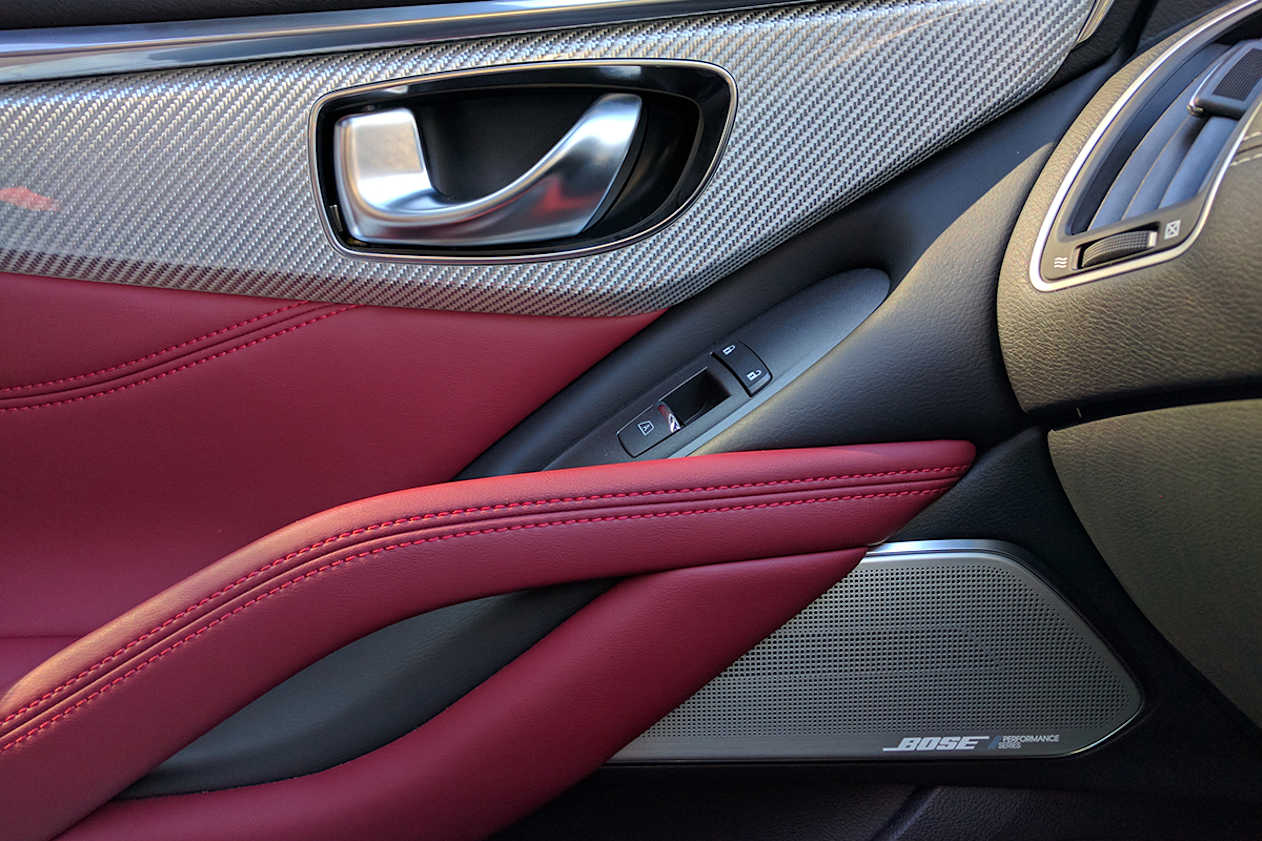 The interior styling includes tasteful amounts of leather covering the comfy bolster seats and doors and a premium looking 13-speaker Bose surround-sound system.