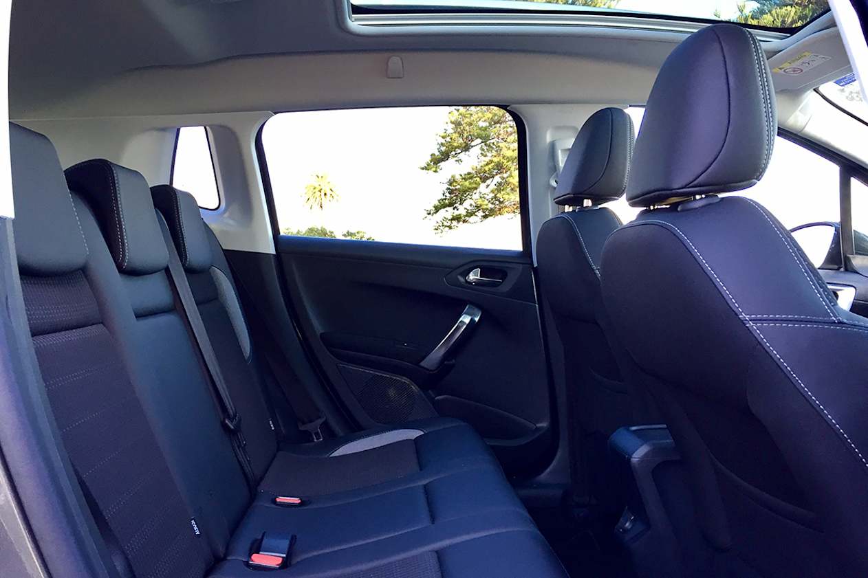 I’m a tall freak at 191cm and the only way I could sit behind my driving position was with my knees mashed into the seat back. (Image credit: Richard Berry)