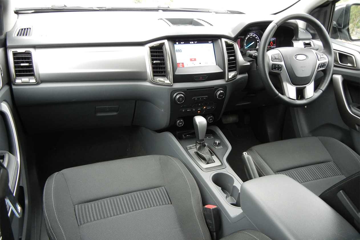 Up front in the Ranger you&#039;ll find a base menu of cabin storage options like a single glovebox and a centre console with a front storage cubby. (XLT model shown)