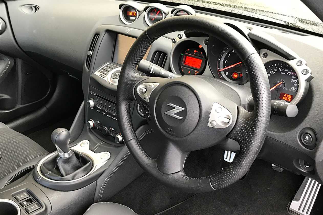 Inside, echoes of Zeds past abound, with a trio of hooded gauges (clock, voltmeter, oil temp) sitting in the centre of the dash top. (image: James Cleary)