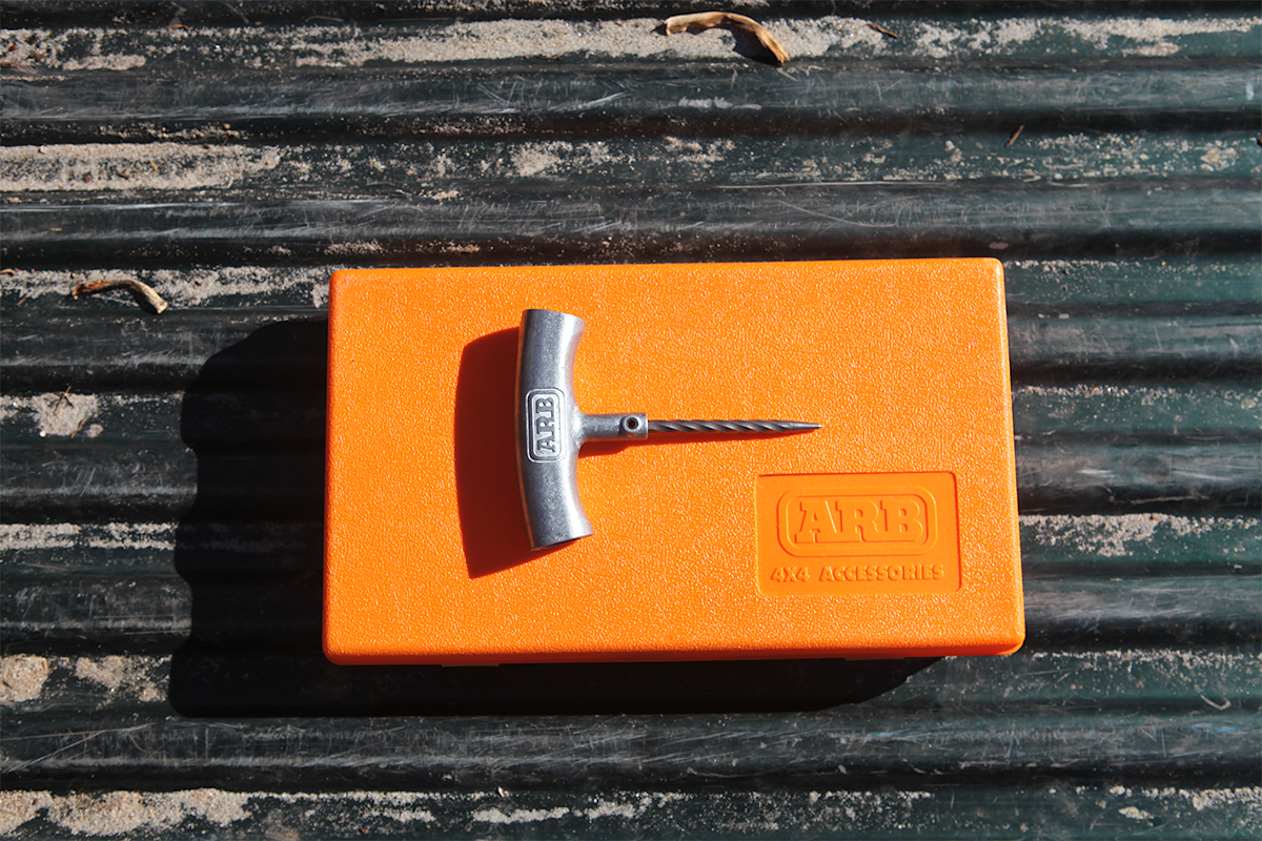 The reamer: It looks like a cross between a short ice pick and a drill bit with a handle.