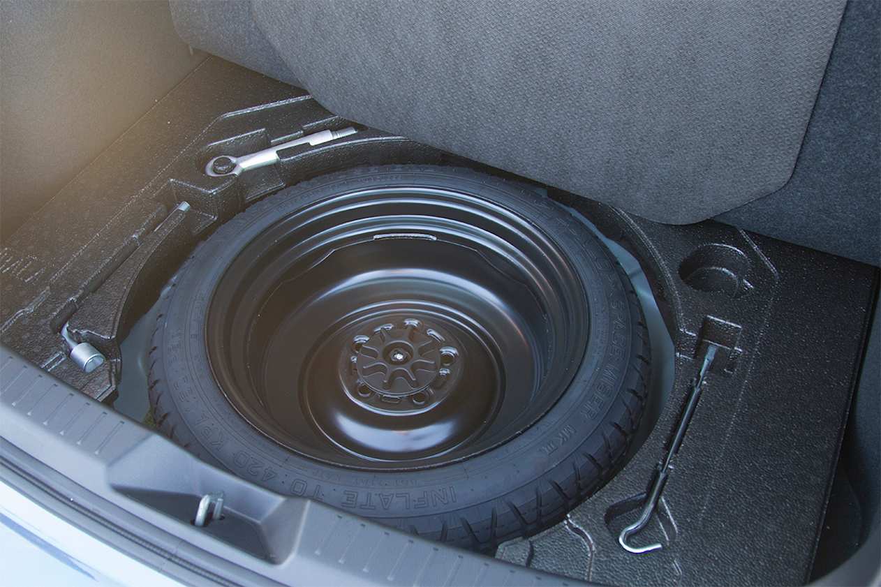 All Mazda 3s come with a space saver spare tyre. (2018 Touring model shown)