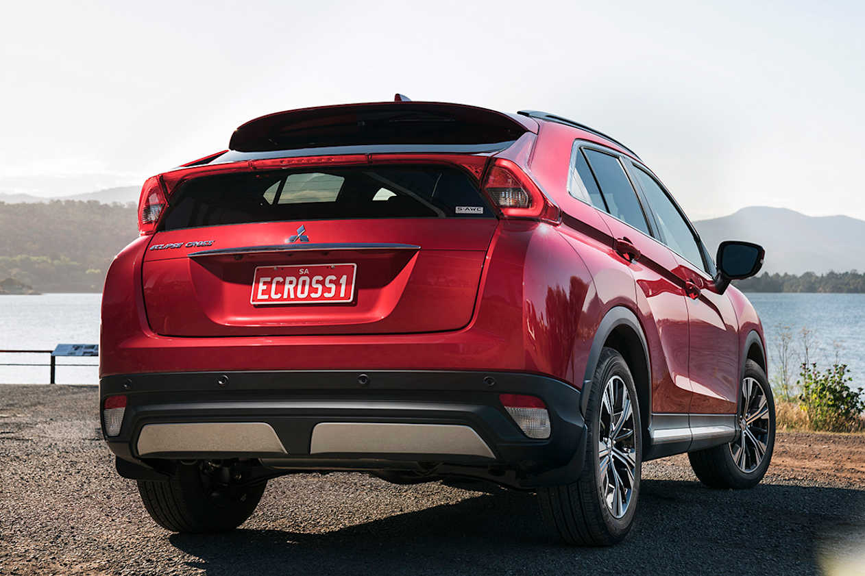 The rear end also features a back window split by a rear spoiler. (Exceed model shown)