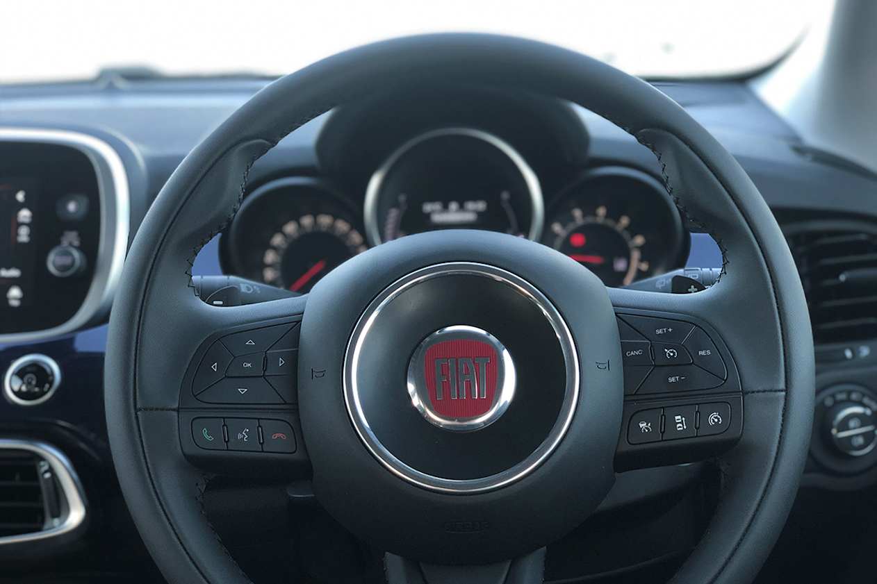 The steering wheel is at a weird angle.