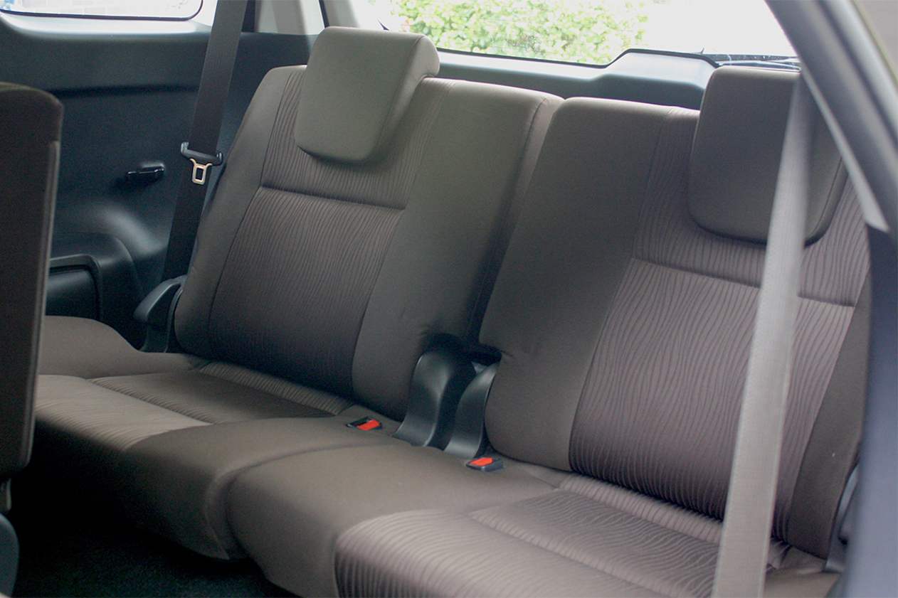 Children fit in the third row but will complain about space, storage and comfort levels at some point.