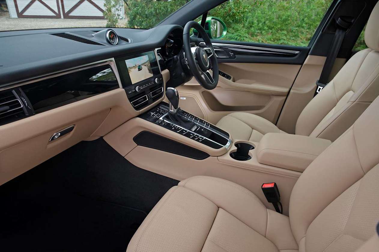 There's the usual dual cup holders front and rear, and bottle holders in each door.