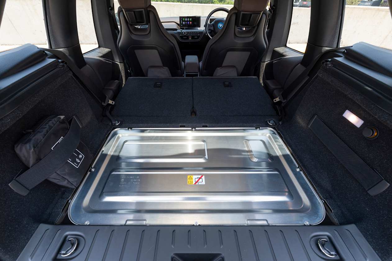 Tie-down anchors, an elasticised pocket and 12-volt power are provided.